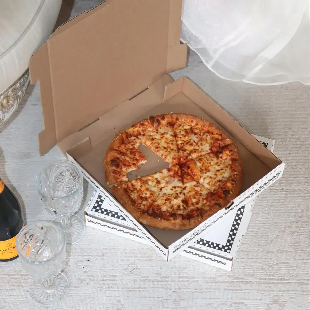 Use pizza boxes as serving trays or table centerpieces
