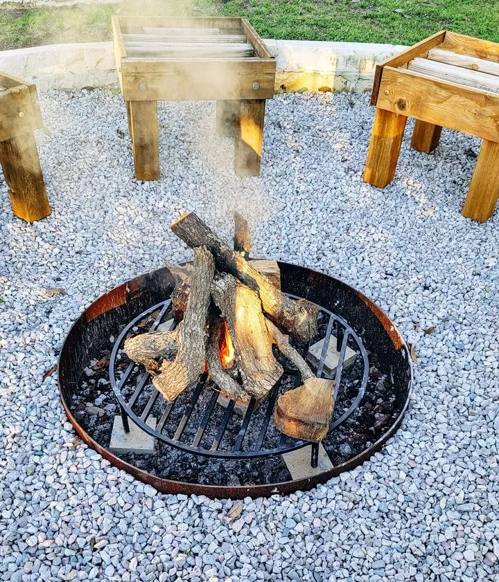 Campfire-style log circle pit