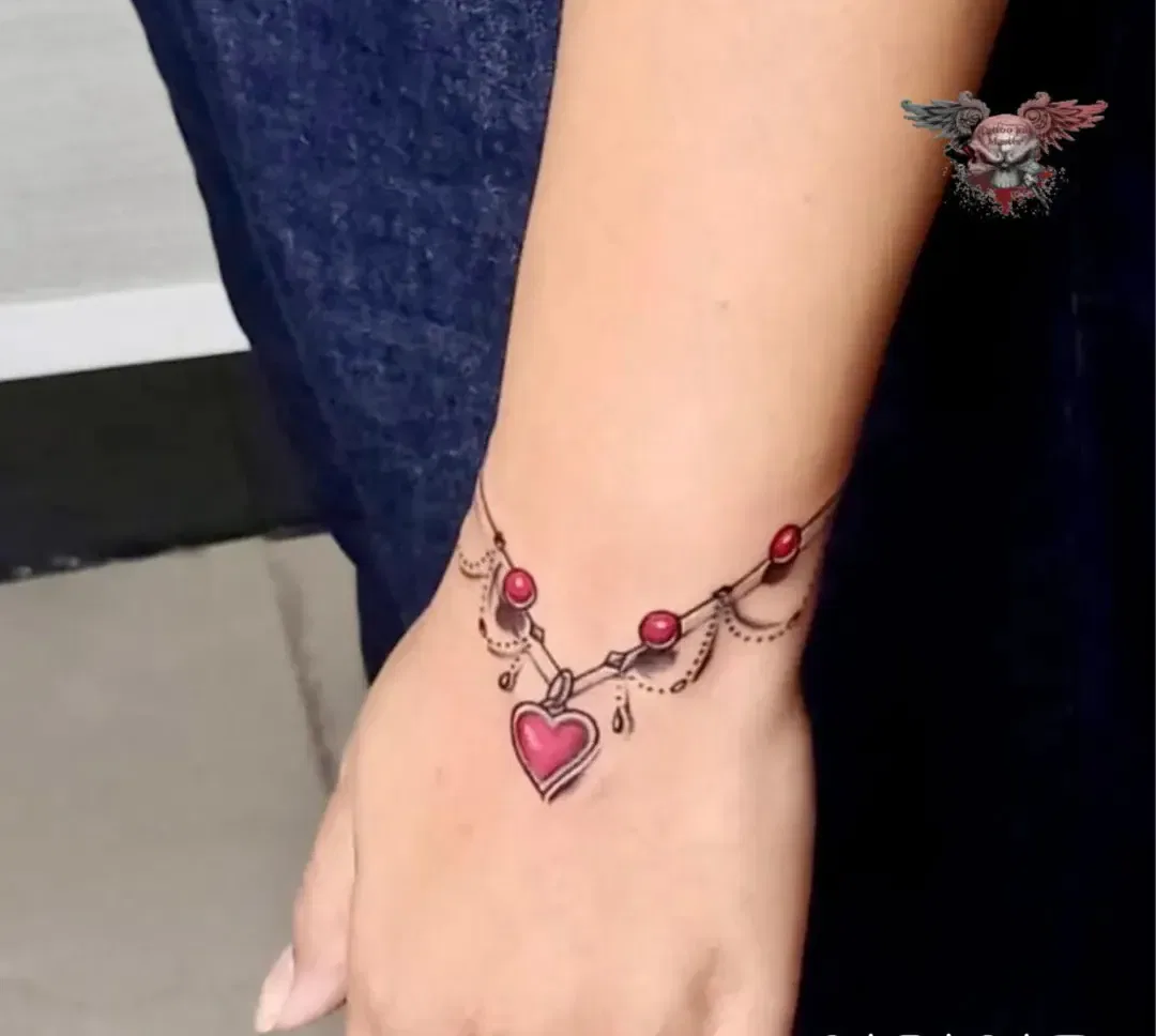Tiny Heart Chain Tattoo