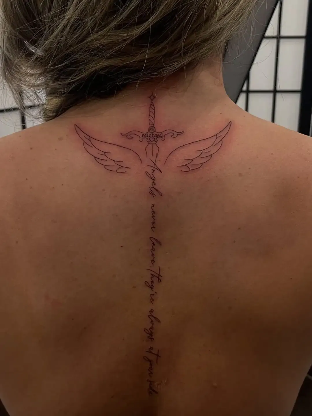 Angel Wings Spine Tattoo