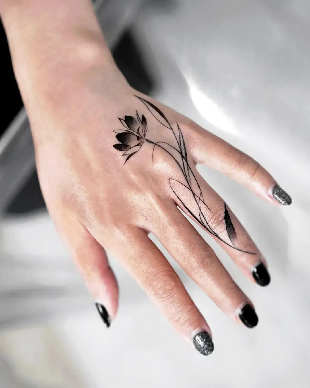 Finger Lotus Tattoo