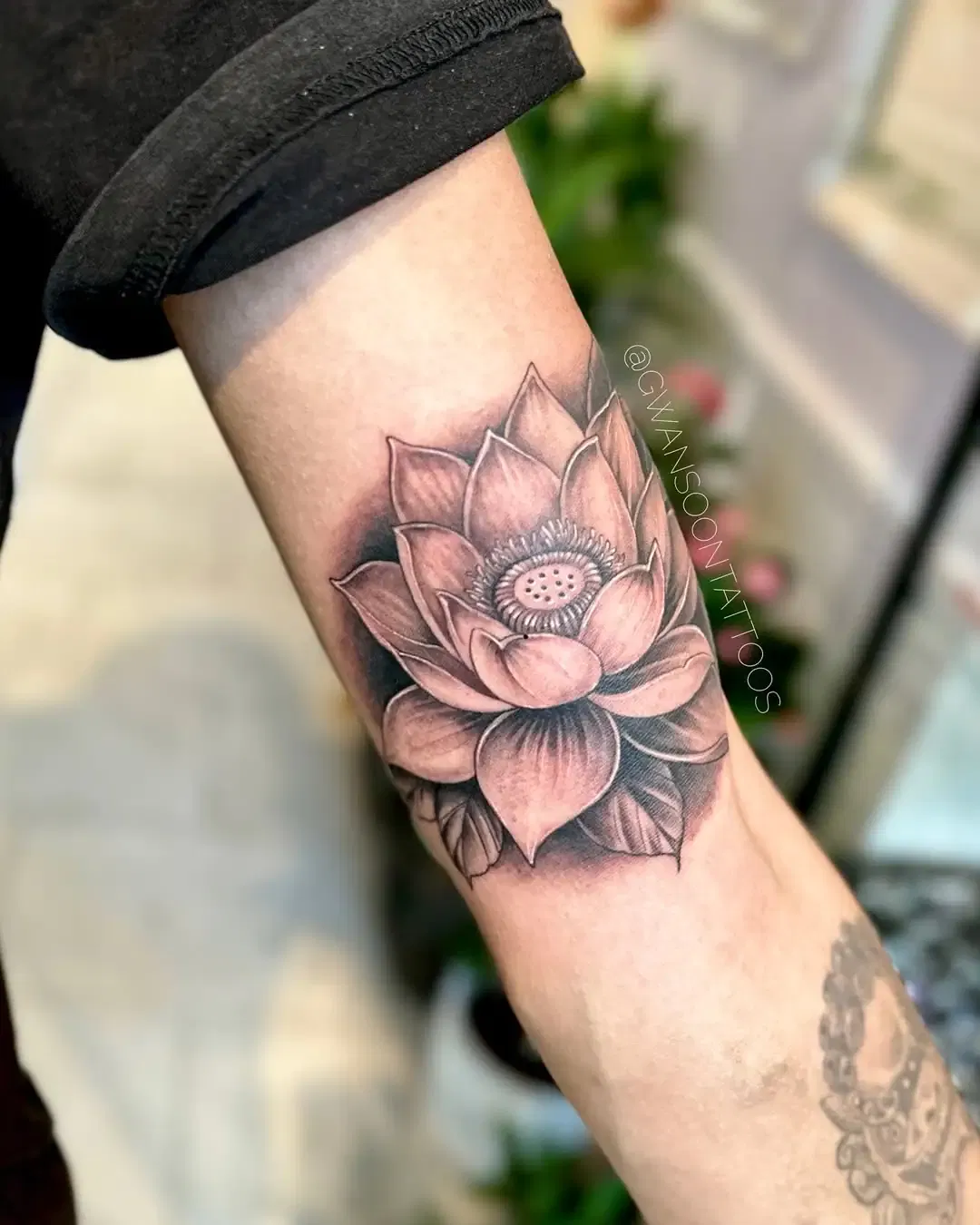 Lotus Arm tattoo