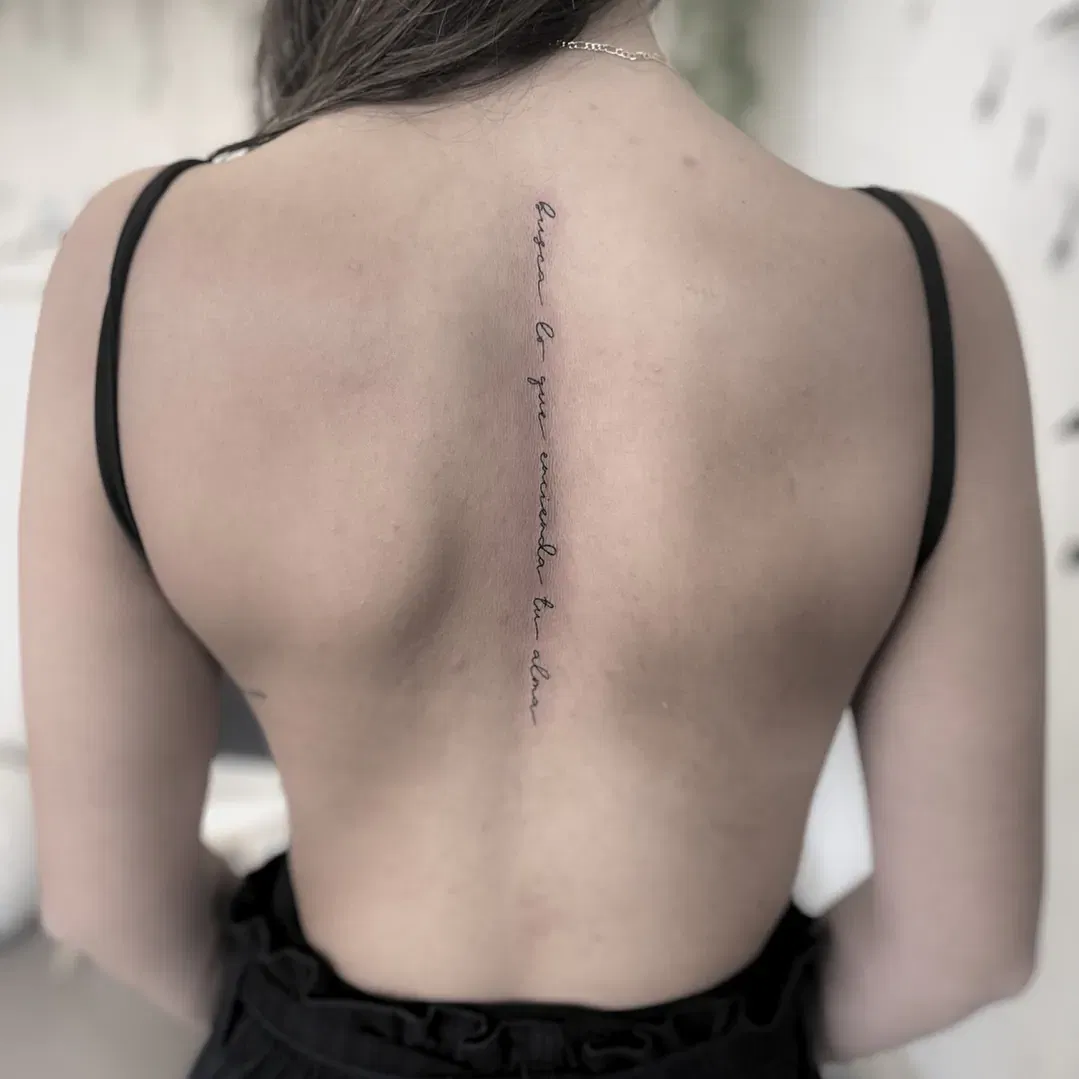 Simple Line Spine Tattoo