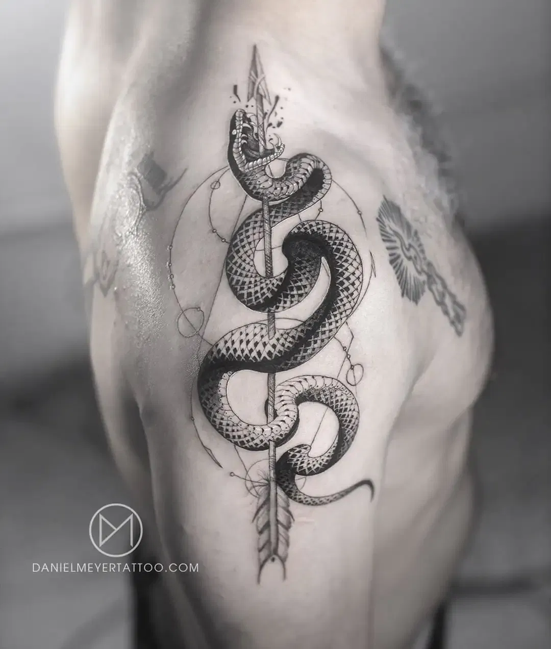 Snake and Arrow Tattoo