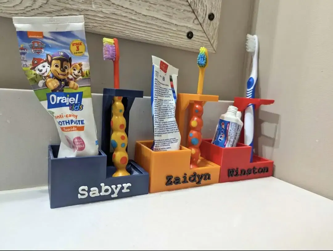 Toothbrush holders with sections