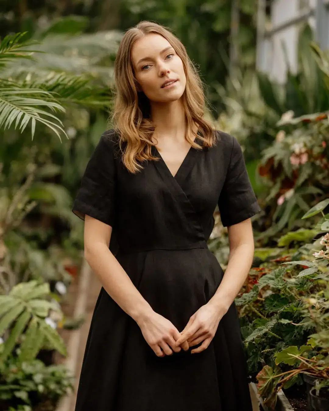 Wrap dress with minimal jewelry